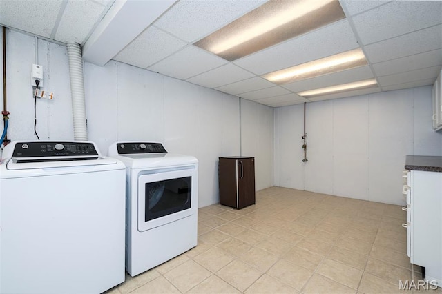 1730 Blakefield Ter, Manchester, MO 63021 - washroom with cabinet space, separate washer and dryer, and a decorative wall