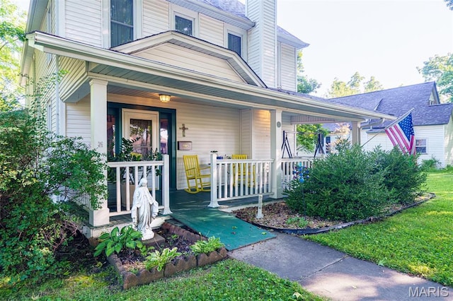 131 W James Blvd, St James, MO 65559 - property entrance featuring a porch and a chimney