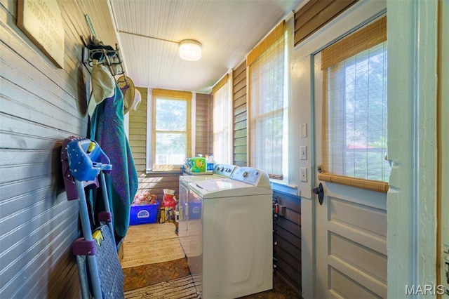 131 W James Blvd, St James, MO 65559 - laundry room featuring separate washer and dryer and wooden walls