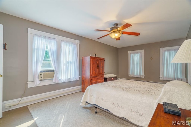 131 W James Blvd, St James, MO 65559 - bedroom featuring a ceiling fan and cooling unit