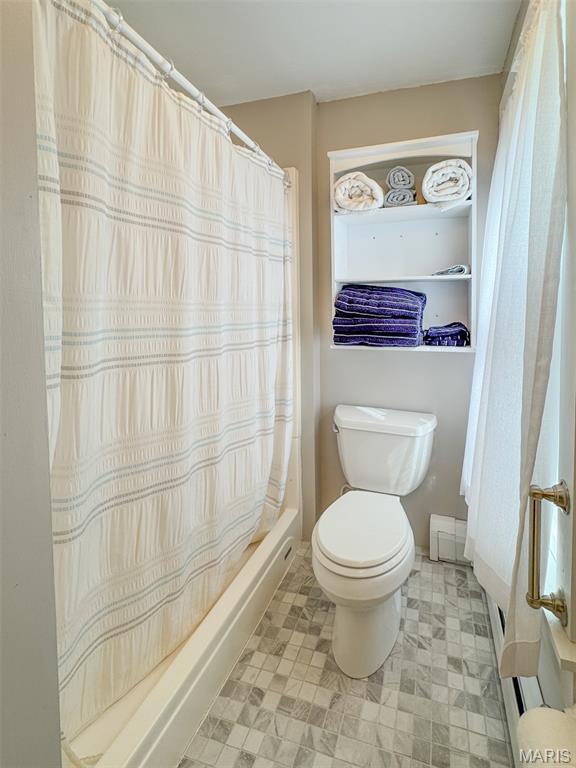131 W James Blvd, St James, MO 65559 - full bath featuring toilet and shower / bath combo with shower curtain