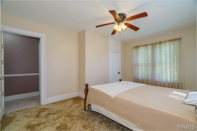 131 W James Blvd, St James, MO 65559 - carpeted bedroom with baseboards and ceiling fan