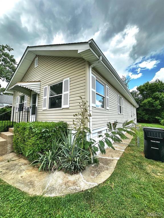 1604 Quendo Ave, Saint Louis, MO 63130 - view of home's exterior with a yard