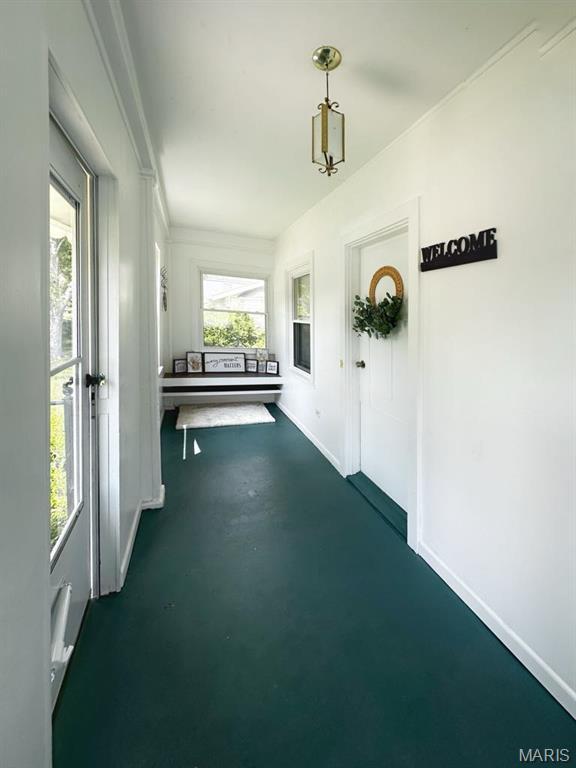 1604 Quendo Ave, Saint Louis, MO 63130 - corridor with finished concrete floors and baseboards