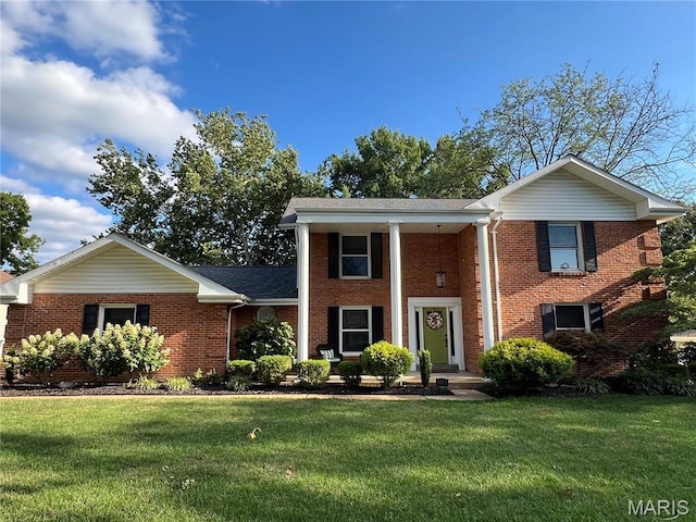 538 Kenilworth Ln, Ballwin, MO 63011 - neoclassical / greek revival house with brick siding and a front yard