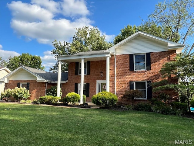 538 Kenilworth Ln, Ballwin, MO 63011 - greek revival inspired property featuring a front yard and brick siding