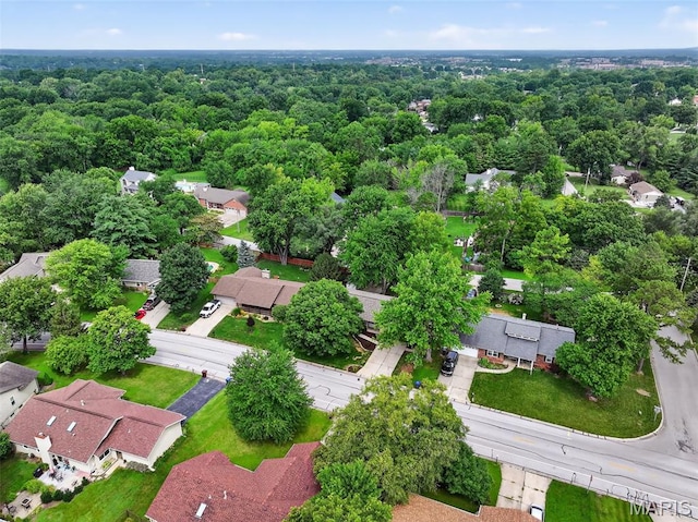 538 Kenilworth Ln, Ballwin, MO 63011 - aerial perspective of suburban area featuring a forest