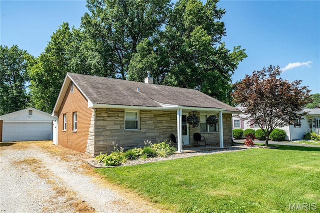 2004 Cottage Ave, Granite City, IL 62040 - view of front of property featuring stone siding, an outdoor structure, covered porch, a front lawn, and roof with shingles