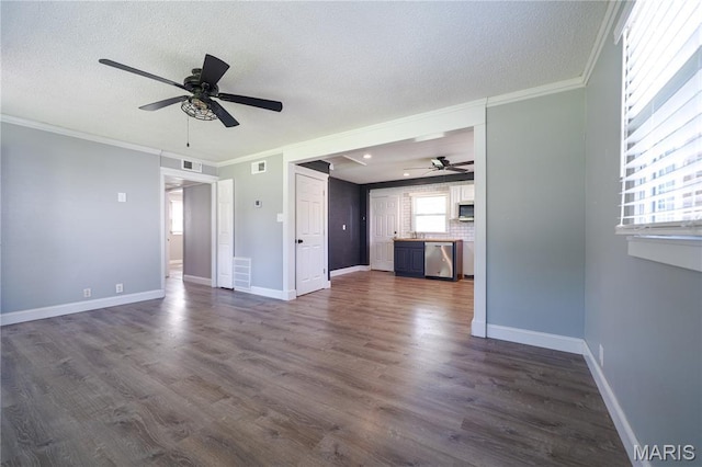 2004 Cottage Ave, Granite City, IL 62040 - unfurnished living room featuring a ceiling fan, ornamental molding, dark wood-type flooring, and a textured ceiling