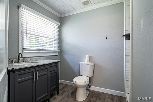 2004 Cottage Ave, Granite City, IL 62040 - bathroom featuring ornamental molding, vanity, wood finished floors, and a closet