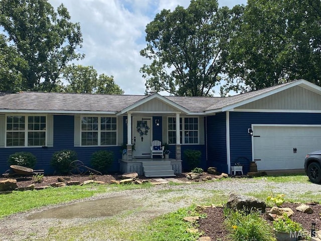 9262 State Route Aa, Farmington, MO 63640 - ranch-style home with an attached garage, a porch, dirt driveway, and roof with shingles