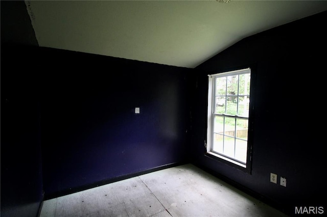 814 Vine St, Poplar Bluff, MO 63901 - empty room with vaulted ceiling and baseboards