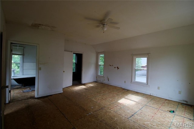 814 Vine St, Poplar Bluff, MO 63901 - empty room with a ceiling fan and vaulted ceiling