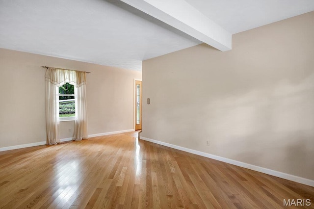 127 Hilltop Trl, Eureka, MO 63025 - unfurnished room with light wood finished floors and beam ceiling