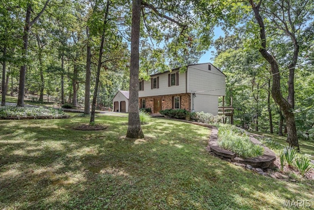 127 Hilltop Trl, Eureka, MO 63025 - colonial-style house with brick siding and a front yard