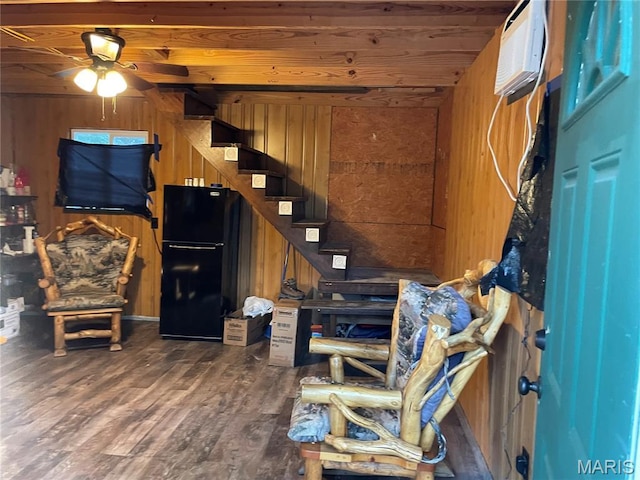 421 Park Ln, Union, MO 63084 - living area with wooden walls, ceiling fan, wood finished floors, stairs, and wooden ceiling