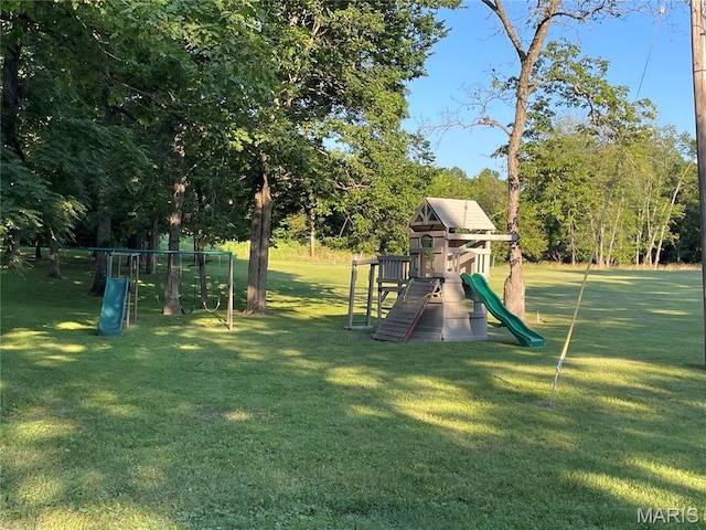 421 Park Ln, Union, MO 63084 - view of play area with a yard and view of wooded area