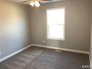 1158 Marathon Dr, Foristell, MO 63348 - carpeted empty room featuring ceiling fan and baseboards