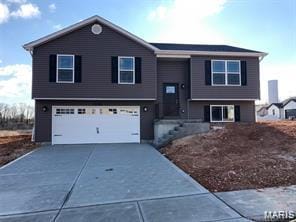 1158 Marathon Dr, Foristell, MO 63348 - raised ranch featuring driveway and an attached garage