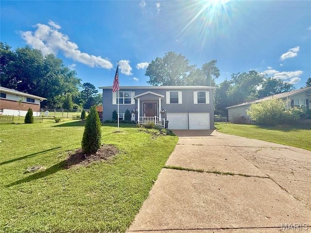 2284 Sunnyridge Dr, Arnold, MO 63010 - split foyer home with concrete driveway and an attached garage