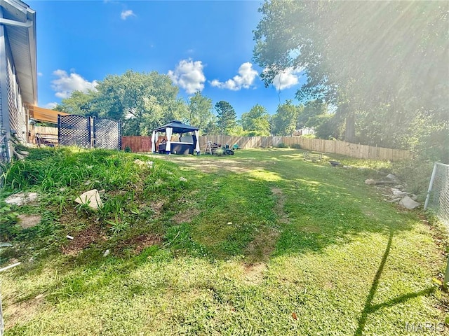 2284 Sunnyridge Dr, Arnold, MO 63010 - fenced backyard with a gazebo