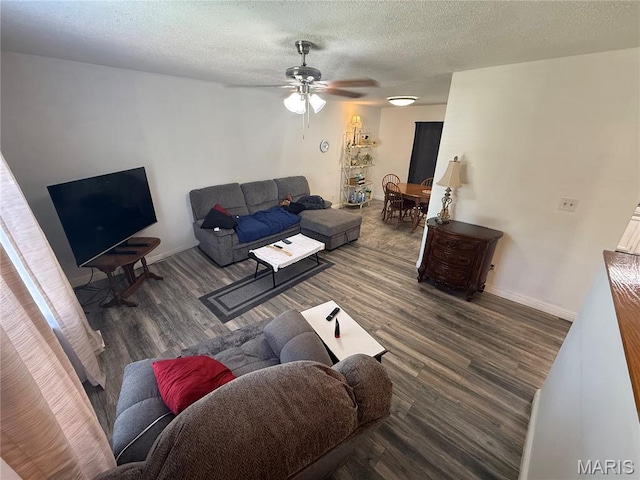 2284 Sunnyridge Dr, Arnold, MO 63010 - living area with wood finished floors, ceiling fan, and a textured ceiling