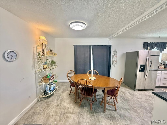 2284 Sunnyridge Dr, Arnold, MO 63010 - dining area featuring a textured ceiling