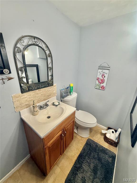2284 Sunnyridge Dr, Arnold, MO 63010 - half bath featuring toilet and vanity