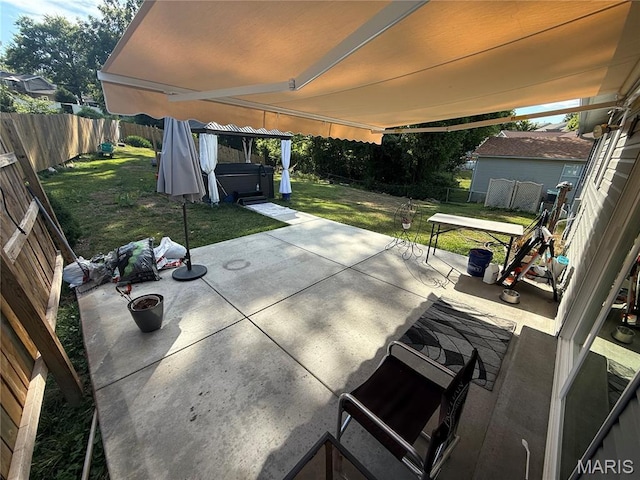 2284 Sunnyridge Dr, Arnold, MO 63010 - fenced backyard featuring a hot tub and a patio