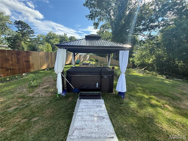 2284 Sunnyridge Dr, Arnold, MO 63010 - fenced backyard featuring a hot tub and a gazebo