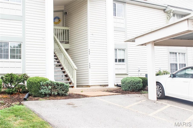 761 Sugar Glen Dr Unit 5, Saint Peters, MO 63376 - view of exterior entry featuring covered and uncovered parking