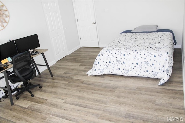 761 Sugar Glen Dr Unit 5, Saint Peters, MO 63376 - bedroom featuring wood finished floors and a desk