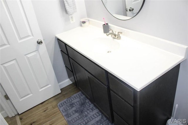 761 Sugar Glen Dr Unit 5, Saint Peters, MO 63376 - bathroom featuring vanity and wood finished floors