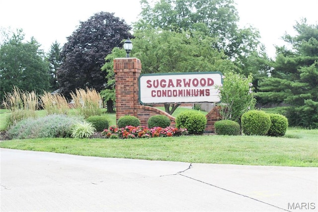 761 Sugar Glen Dr Unit 5, Saint Peters, MO 63376 - community sign featuring a lawn