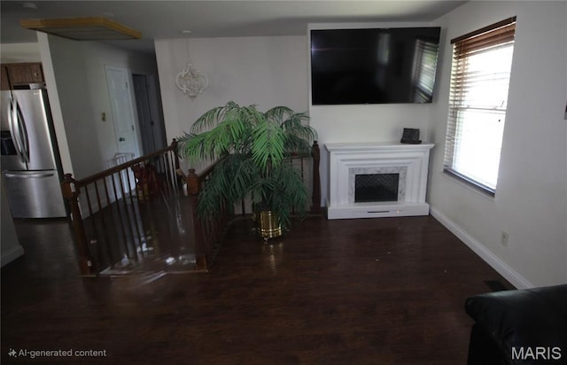 2890 Tommy Dr, Arnold, MO 63010 - living area with wood finished floors and a high end fireplace