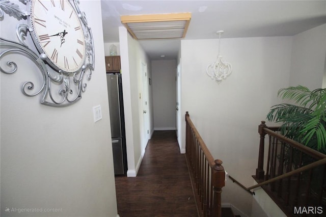 2890 Tommy Dr, Arnold, MO 63010 - corridor featuring an upstairs landing, a chandelier, and wood finished floors