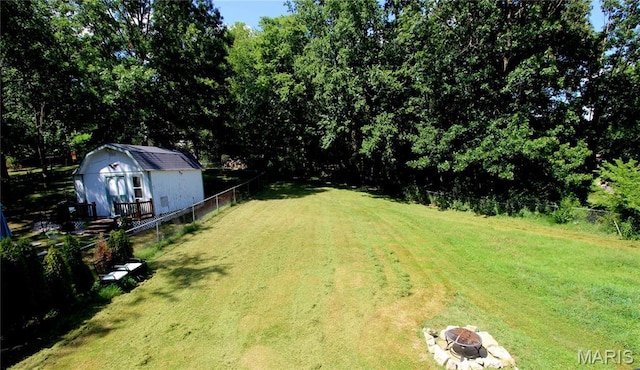 2890 Tommy Dr, Arnold, MO 63010 - view of yard with a fire pit and a storage shed