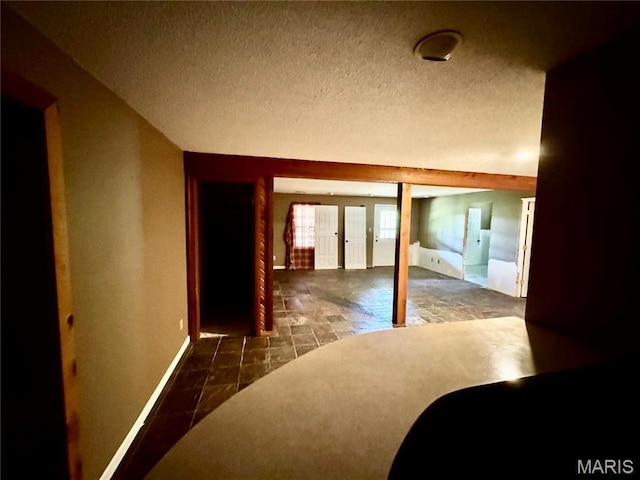 5250 Wren Ln, Osage Beach, MO 65065 - corridor featuring a textured ceiling
