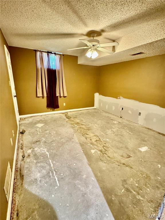 5250 Wren Ln, Osage Beach, MO 65065 - unfurnished room with a textured ceiling