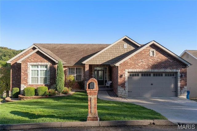 9882 W Vista Dr, Hillsboro, MO 63050 - view of front facade with a garage, driveway, a front lawn, and brick siding