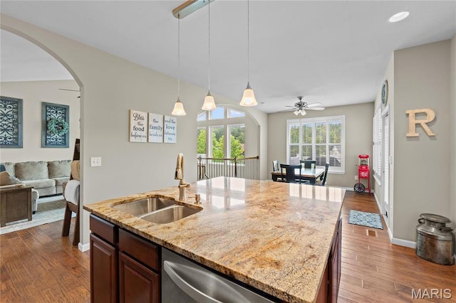 9882 W Vista Dr, Hillsboro, MO 63050 - kitchen with open floor plan, dishwasher, arched walkways, dark wood-style flooring, and recessed lighting