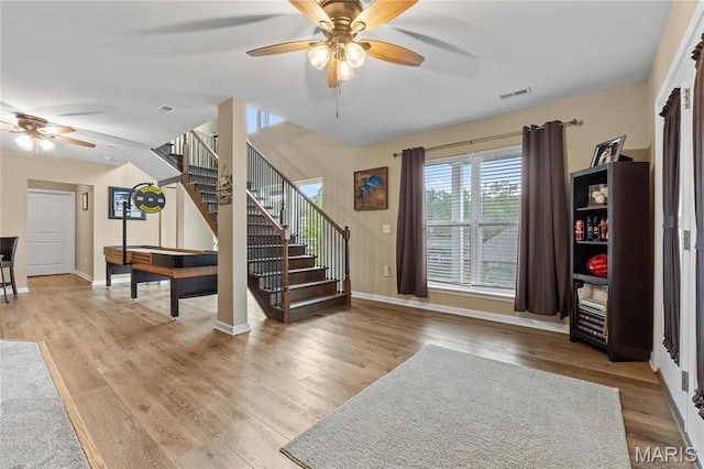 9882 W Vista Dr, Hillsboro, MO 63050 - entrance foyer with a ceiling fan, stairs, and wood finished floors