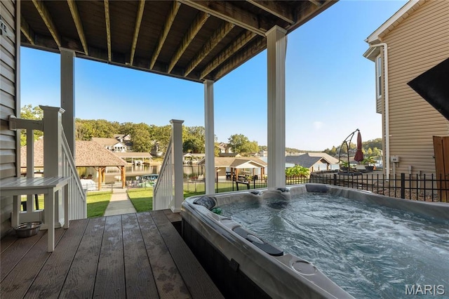 9882 W Vista Dr, Hillsboro, MO 63050 - deck featuring an outdoor hot tub, a residential view, and a yard