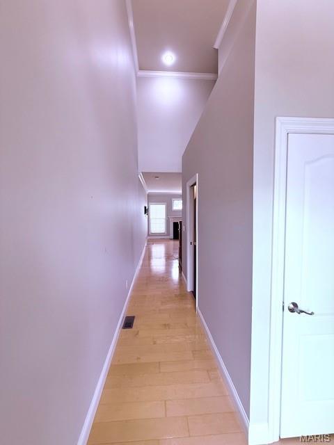205 Prominence Ln, Lake St Louis, MO 63367 - hallway featuring crown molding and light wood-type flooring