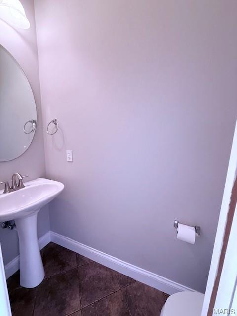 205 Prominence Ln, Lake St Louis, MO 63367 - half bathroom with tile patterned flooring and toilet