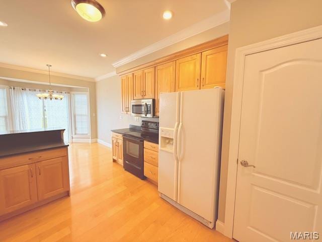 205 Prominence Ln, Lake St Louis, MO 63367 - kitchen with white fridge with ice dispenser, stainless steel microwave, black electric range, dark countertops, and ornamental molding
