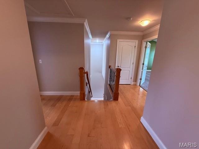 205 Prominence Ln, Lake St Louis, MO 63367 - hallway featuring an upstairs landing, wood finished floors, and ornamental molding