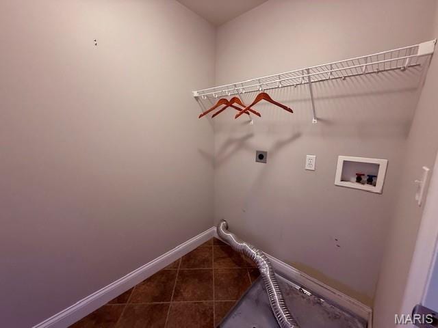 205 Prominence Ln, Lake St Louis, MO 63367 - washroom with hookup for an electric dryer, washer hookup, and dark tile patterned floors