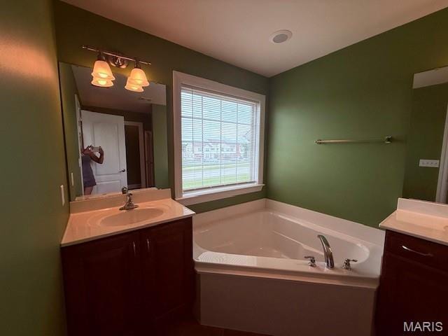 205 Prominence Ln, Lake St Louis, MO 63367 - full bathroom with two vanities and a bath