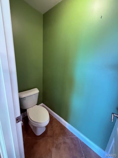 205 Prominence Ln, Lake St Louis, MO 63367 - bathroom with toilet and tile patterned flooring